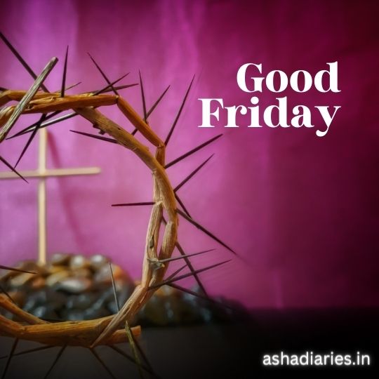 the Image Depicts a Crown of Thorns Foregrounded Against a Purple Background with the Words "good Friday" in White Font. a Small Wooden Cross is Visible in the Background, Slightly out of Focus, Which, Along with the Crown of Thorns, Symbolizes the Crucifixion of Jesus Christ. This Image is Likely Used to Represent Good Friday, a Christian Holiday Commemorating the Crucifixion. the Website Watermark "ashadiaries.in" Suggests It May Originate from an Indian Source or is Intended for an Indian Audience.