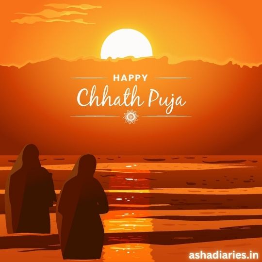 This Image Shows a Vibrant Sunset Scene During Chhath Puja, with Two Women Standing by a Water Body. the Golden Hues of the Setting Sun Reflect on the Water, Creating a Peaceful and Solemn Atmosphere. the Sky is Adorned with Soft Clouds, and the Sun is Depicted As a Bright, Round Disc. Text on the Image Reads "happy Chhath Puja," Emphasizing the Celebratory Message. the Image Captures the Essence of the Festival, Which is Marked by Devotion and Thankfulness Towards the Sun God.