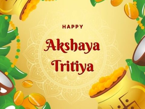 Festive greeting card for Akshaya Tritiya with decorative elements. The card features a vibrant yellow and green color scheme with illustrations of gold coins, golden pots, mango leaves, and a traditional Indian pattern border. The center has a prominent message 'Happy Akshaya Tritiya' in stylized red font on a beige background.