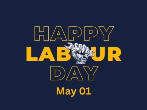 A graphic design for Labour Day featuring a clenched fist and the text "Happy Labour Day - May 01" on a dark background.