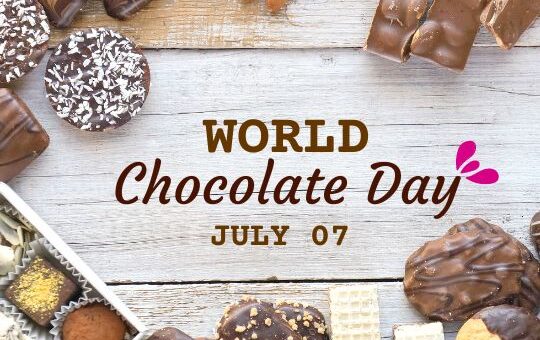 an Assortment of Chocolates and Nuts on a Wooden Surface with Text "world Chocolate Day July 07" Displayed Above.