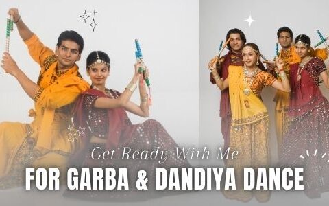 Group of young men and women dressed in traditional Indian attire holding dandiya sticks, getting ready for Garba and Dandiya dance during Navratri celebrations.